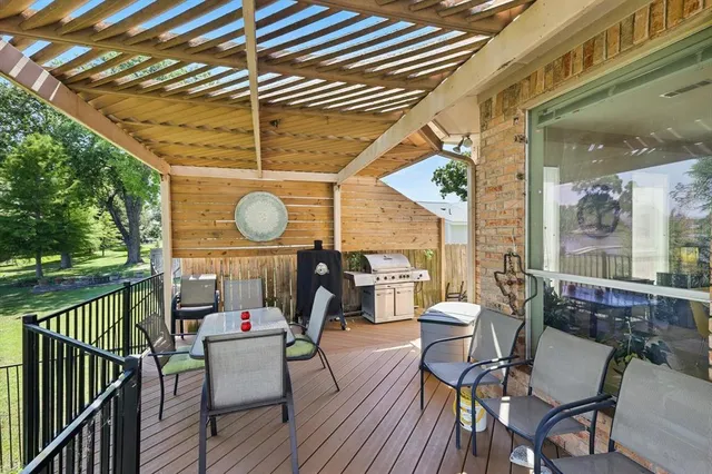 a view of a chairs and tables in the balcony