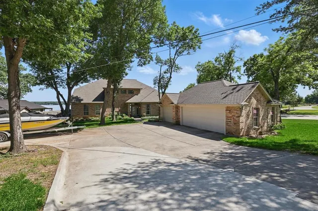 a view of a house with a street