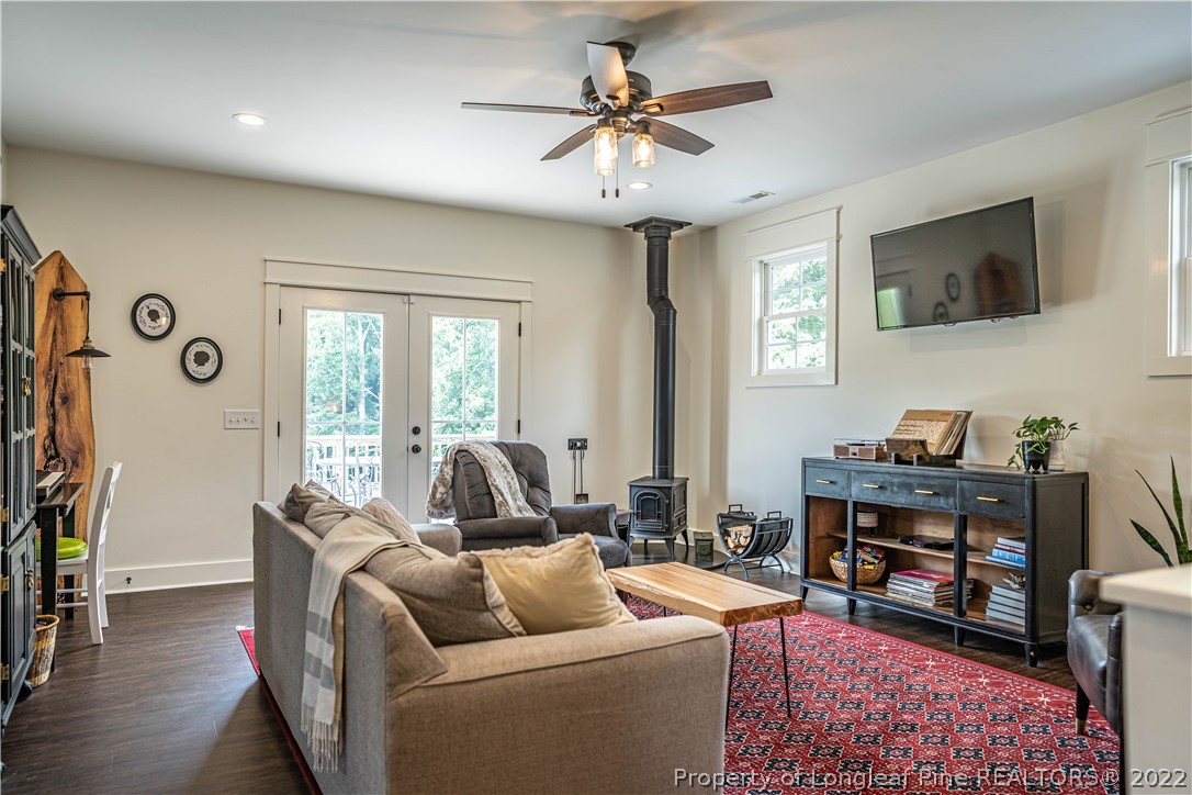 491 Stage Road Carthage, NC 28327 - Photo 13 of 47 a living room with furniture and a flat screen tv