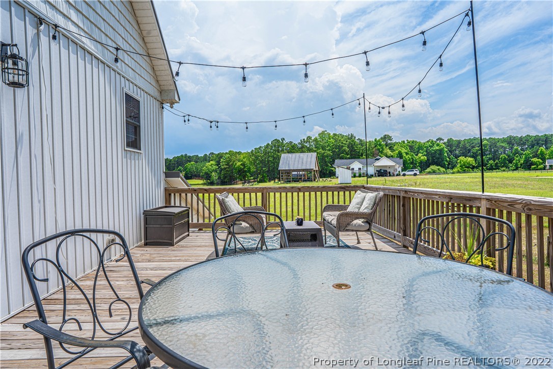 491 Stage Road Carthage, NC 28327 - Photo 29 of 47 a view of a chairs and table on the terrace