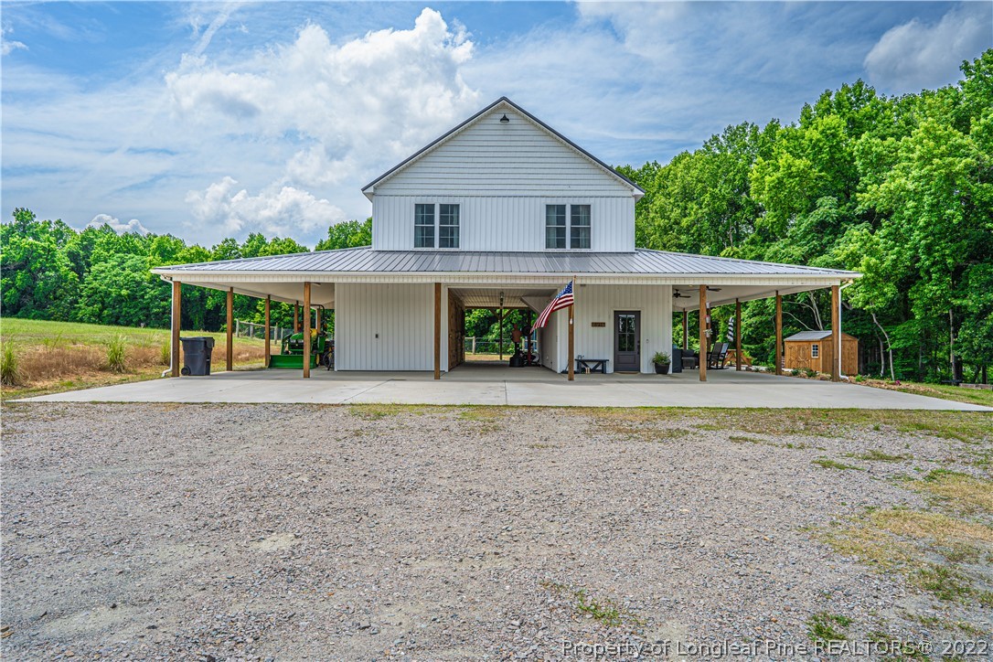 491 Stage Road Carthage, NC 28327 - Photo 3 of 47 front view of a house with a yard