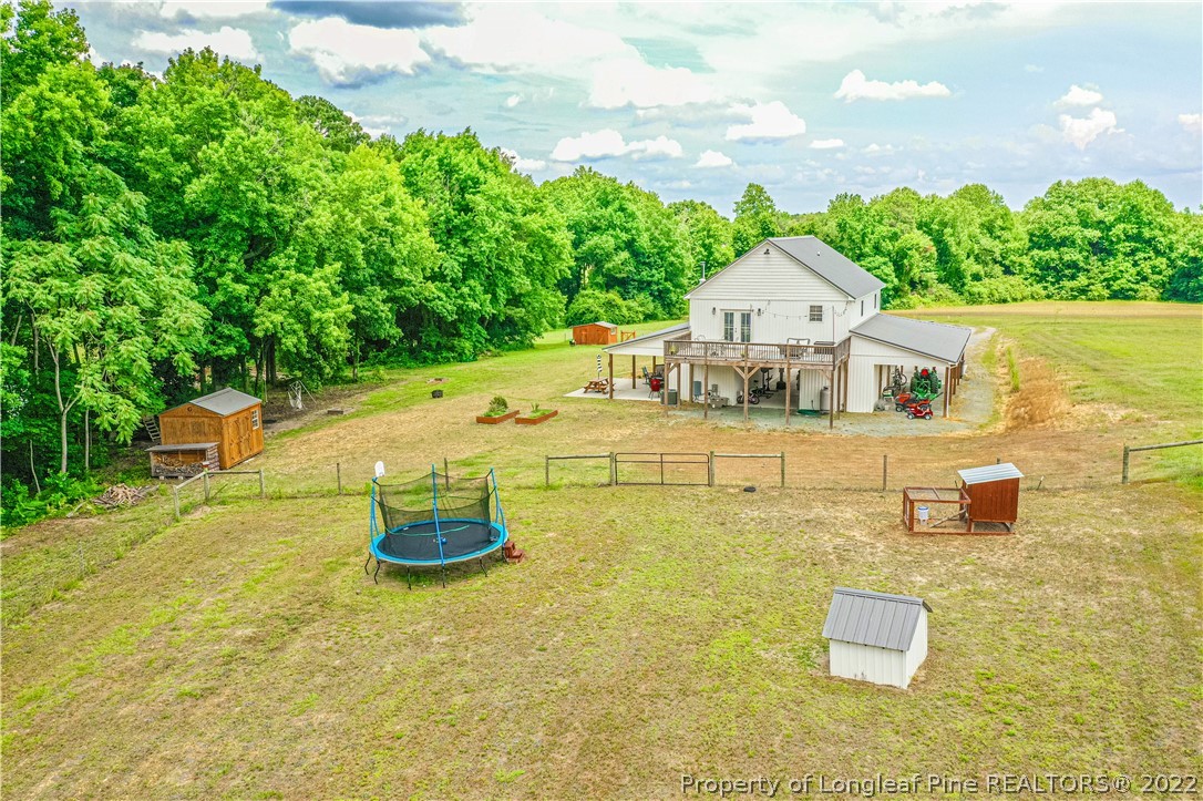 491 Stage Road Carthage, NC 28327 - Photo 33 of 47 a building with trees in front of it