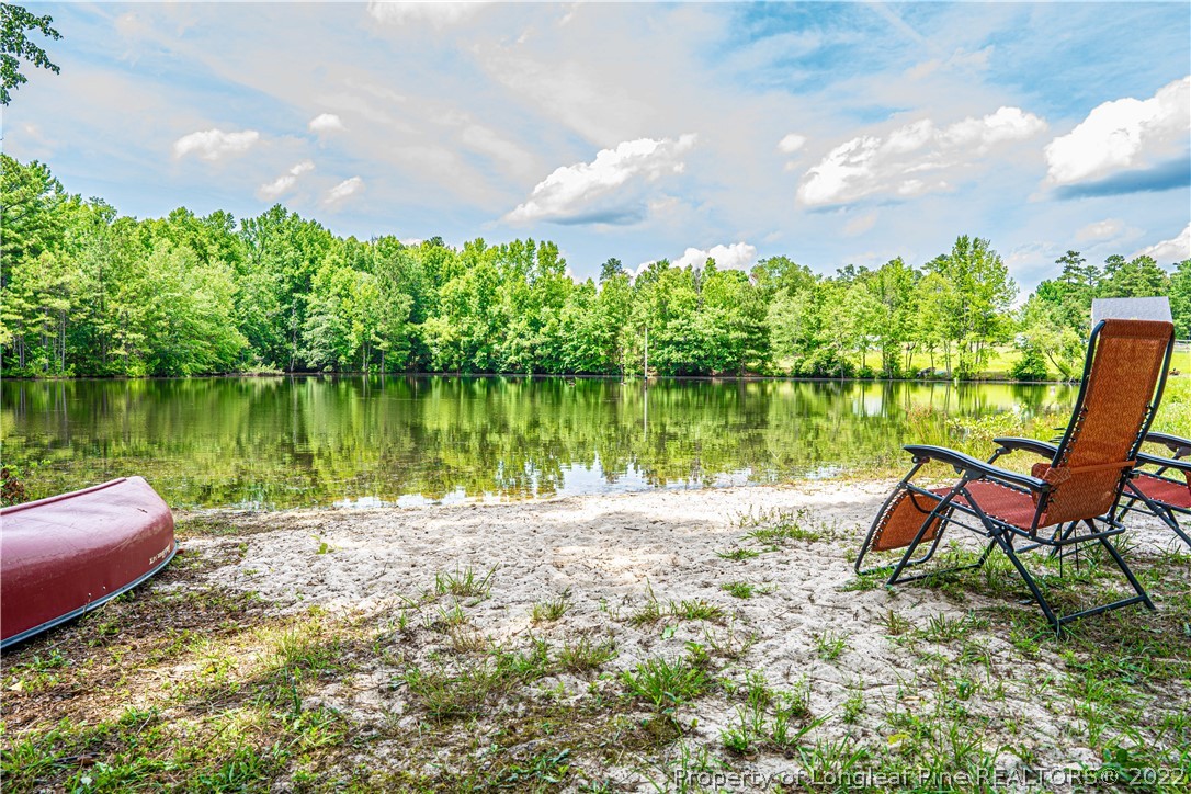 491 Stage Road Carthage, NC 28327 - Photo 42 of 47 a lake view with a sitting space garden and lake view