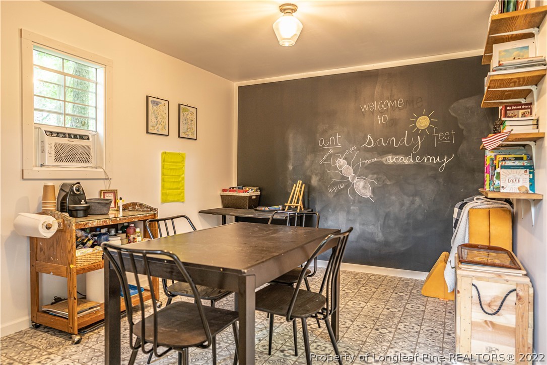 491 Stage Road Carthage, NC 28327 - Photo 44 of 47 a view of a dining room with furniture and window