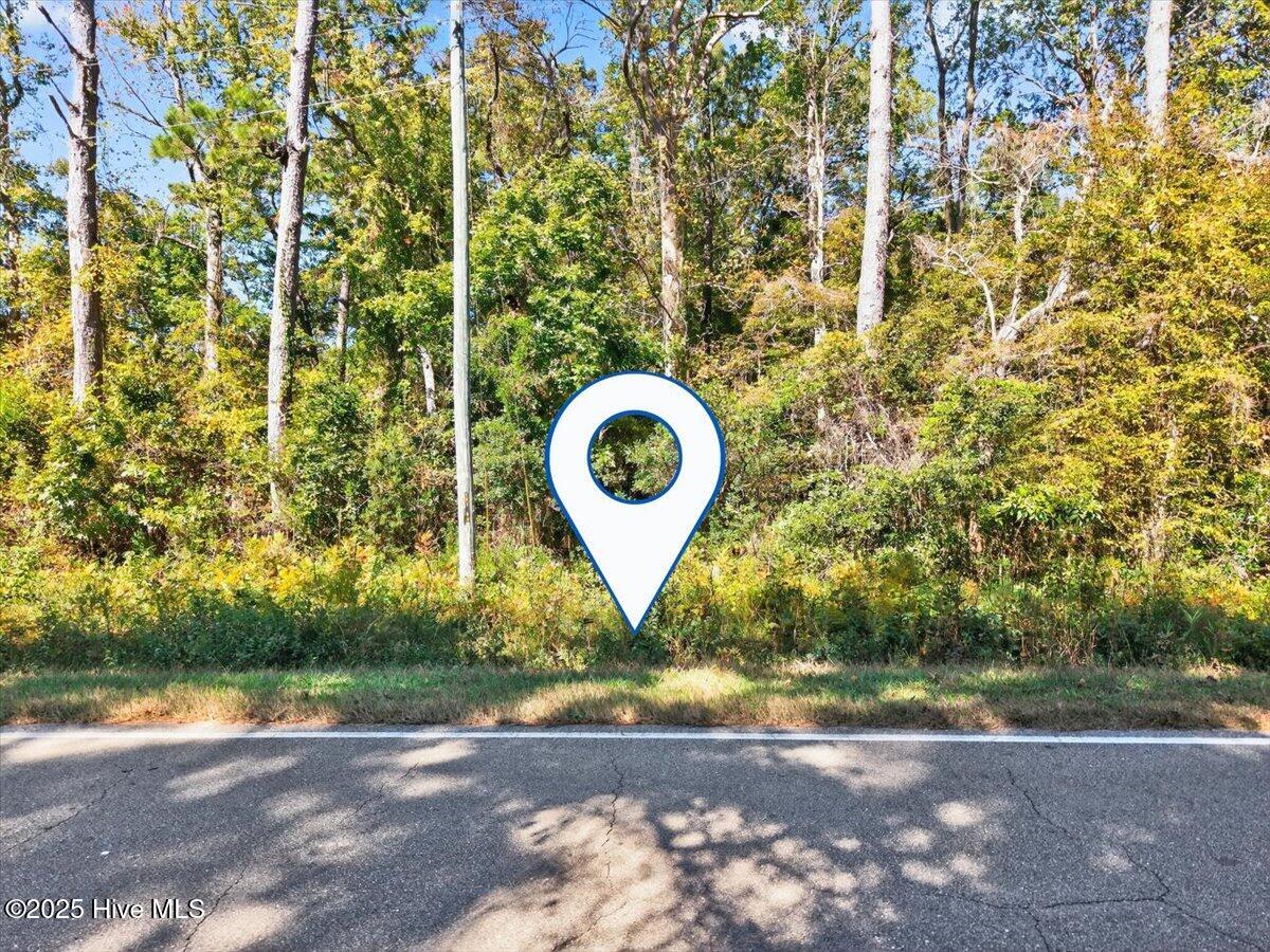 2340 Boones Neck Road Southwest Supply, NC 28462 - Photo 3 of 35 Prime road frontage offers easy access to this 49-acre development opportunity near Holden Beach.