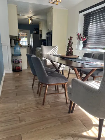 a view of a dining room with furniture