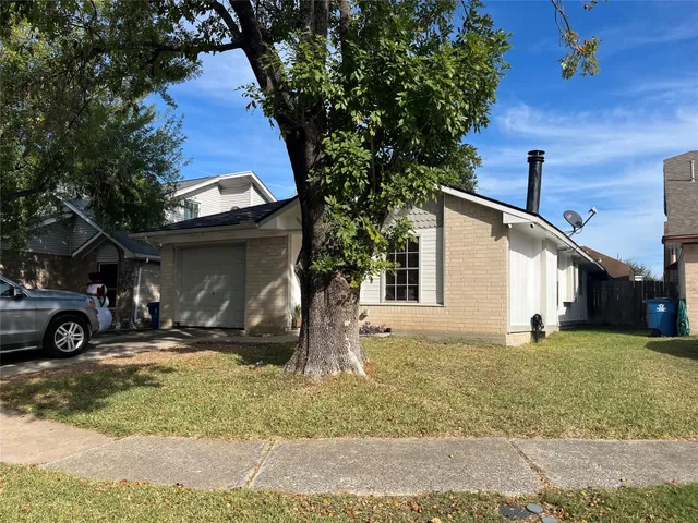 a car parked in front of a house