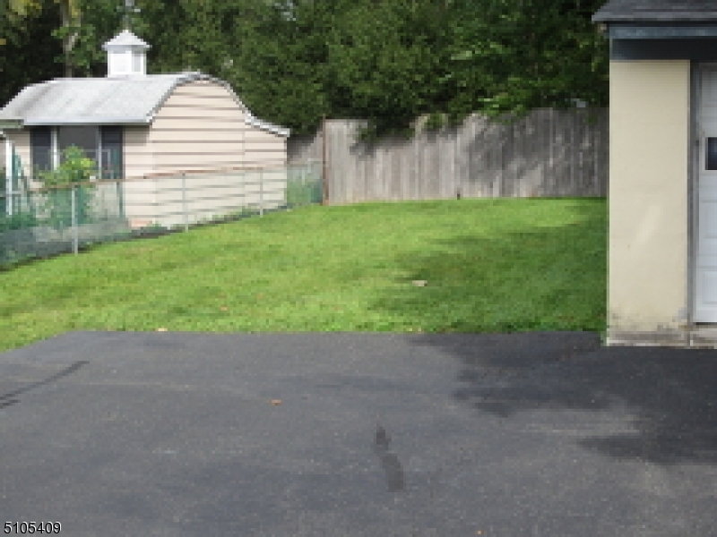 1 Myrtle Avenue Madison, NJ 07940 - Photo 13 of 21 a view of a house with backyard and trees