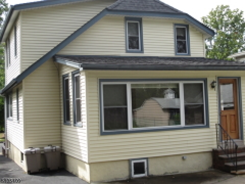 1 Myrtle Avenue Madison, NJ 07940 - Photo 14 of 21 a view of brick house with large windows