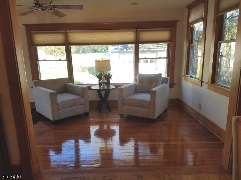 1 Myrtle Avenue Madison, NJ 07940 - Photo 18 of 21 a living room with furniture and a large window