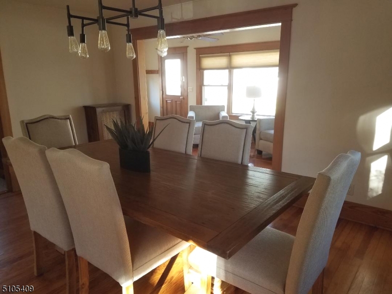1 Myrtle Avenue Madison, NJ 07940 - Photo 19 of 21 a view of a dining room with furniture window and wooden floor