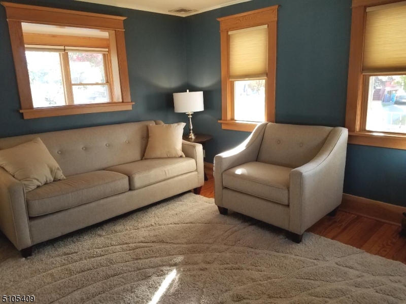 1 Myrtle Avenue Madison, NJ 07940 - Photo 21 of 21 a living room with furniture and a window