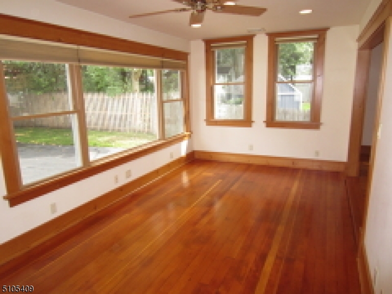 1 Myrtle Avenue Madison, NJ 07940 - Photo 5 of 21 a view of an empty room with a window