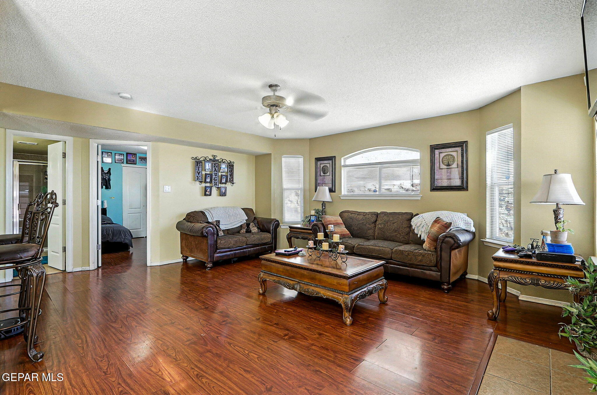 6505 Berringer Street El Paso, TX 79932 - Photo 14 of 51 a living room with furniture and wooden floor