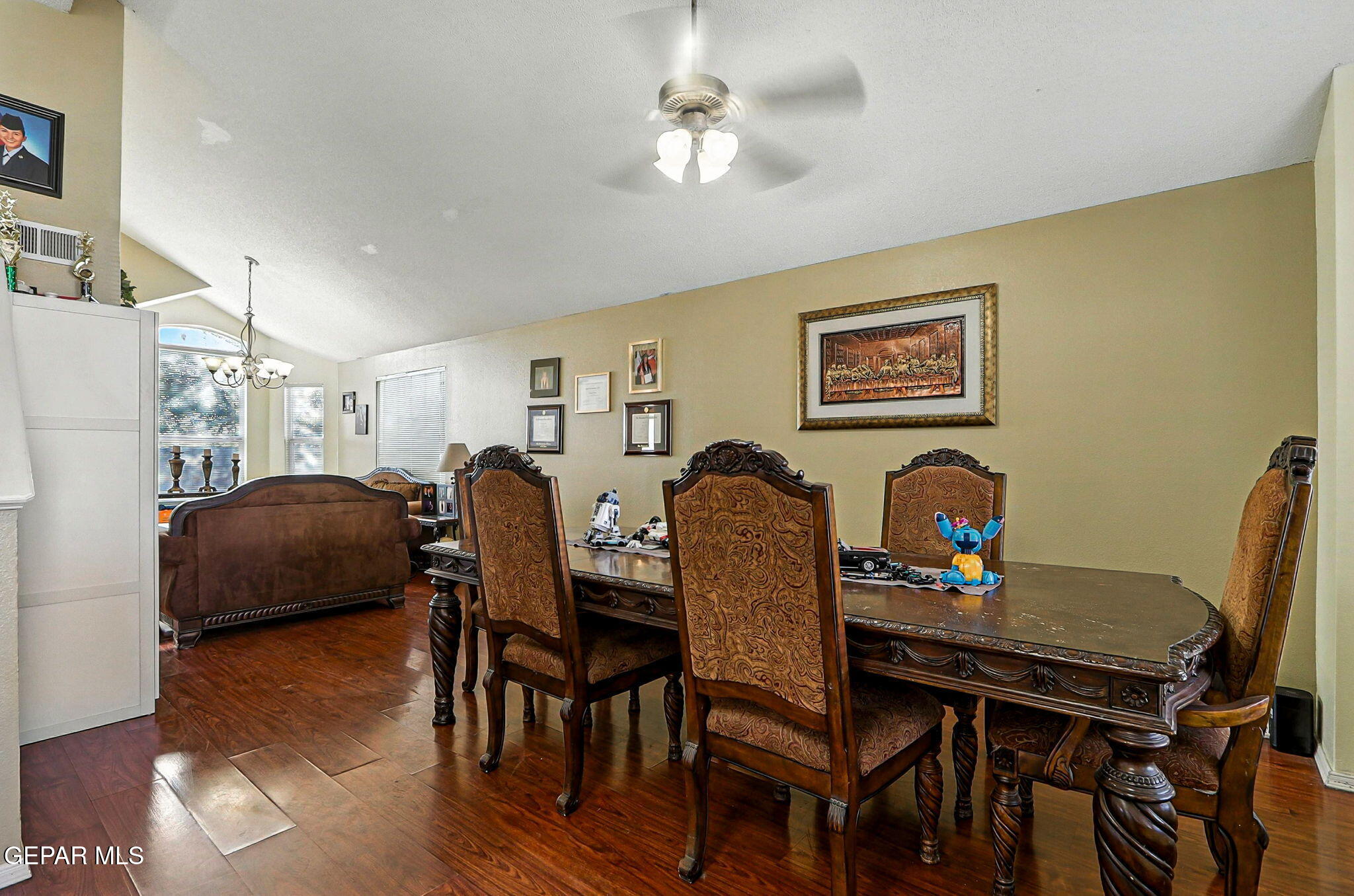 6505 Berringer Street El Paso, TX 79932 - Photo 7 of 51 a view of a dining room with furniture and wooden floor