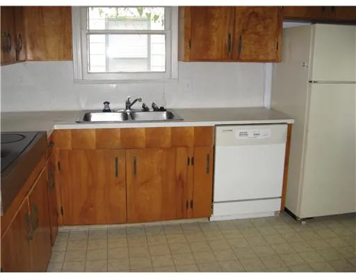 a view of kitchen with wooden floor