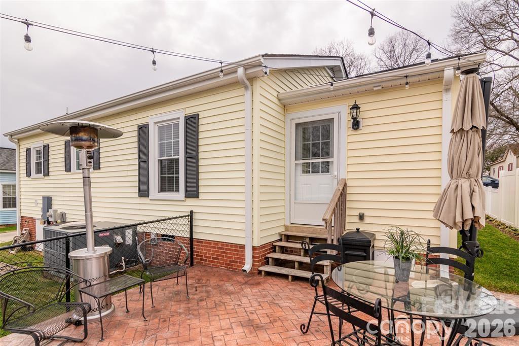 1004 Valley Street Kannapolis, NC 28081 - Photo 14 of 18 a view of a house with patio