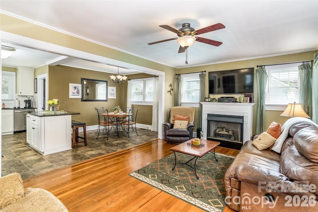 1004 Valley Street Kannapolis, NC 28081 - Photo 3 of 18 a living room with furniture fireplace and a large window