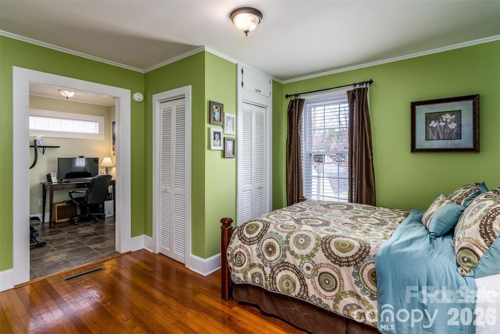 1004 Valley Street Kannapolis, NC 28081 - Photo 7 of 18 a bedroom with a bed and a window