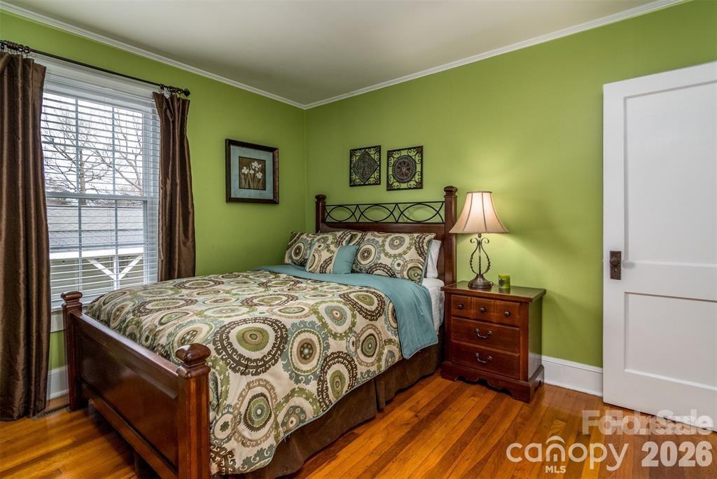 1004 Valley Street Kannapolis, NC 28081 - Photo 8 of 18 a bedroom with a bed and window