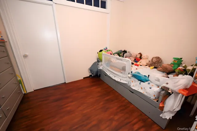 a room with toys and wooden floor