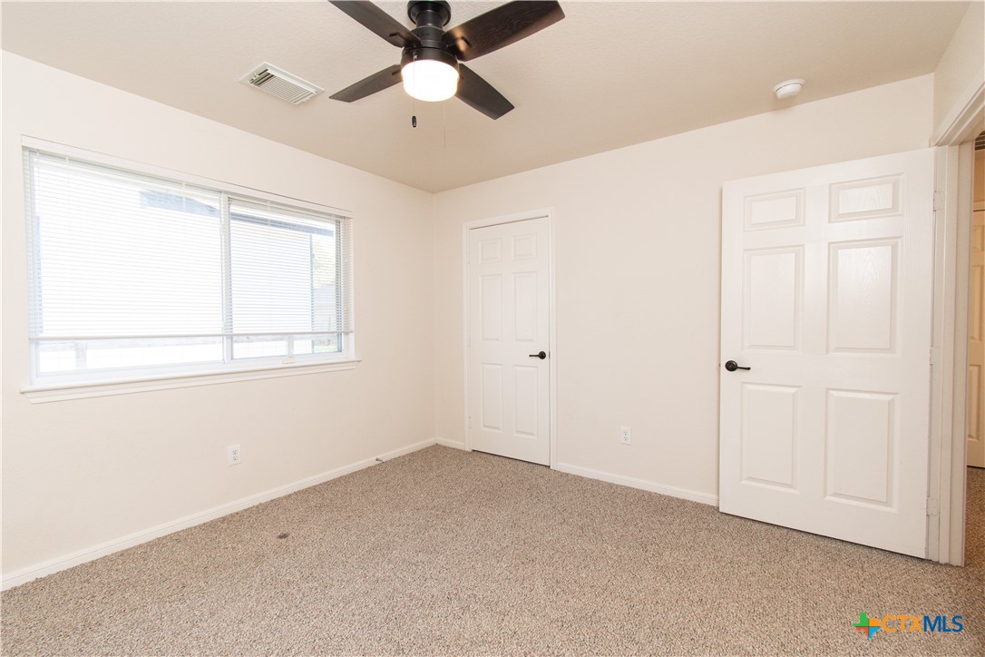 309 Ellis Street San Marcos, TX 78666 - Photo 9 of 18 a view of an empty room with a window