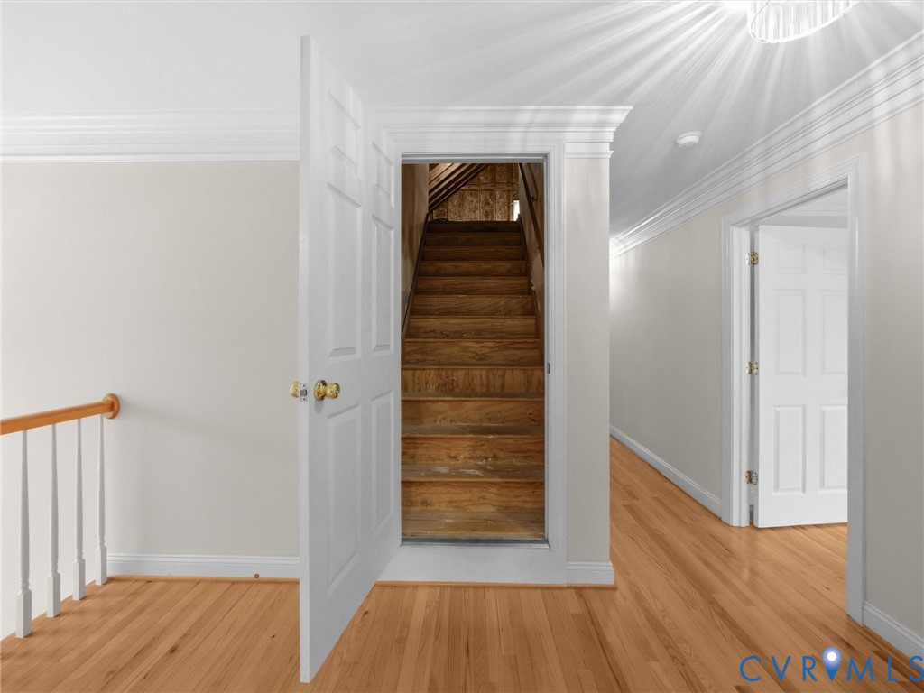 14335 Lander Road Midlothian, VA 23113 - Photo 55 of 70 a view of a hallway with wooden floor and stairs