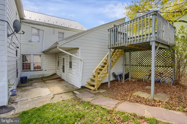 a view of a house with a roof deck
