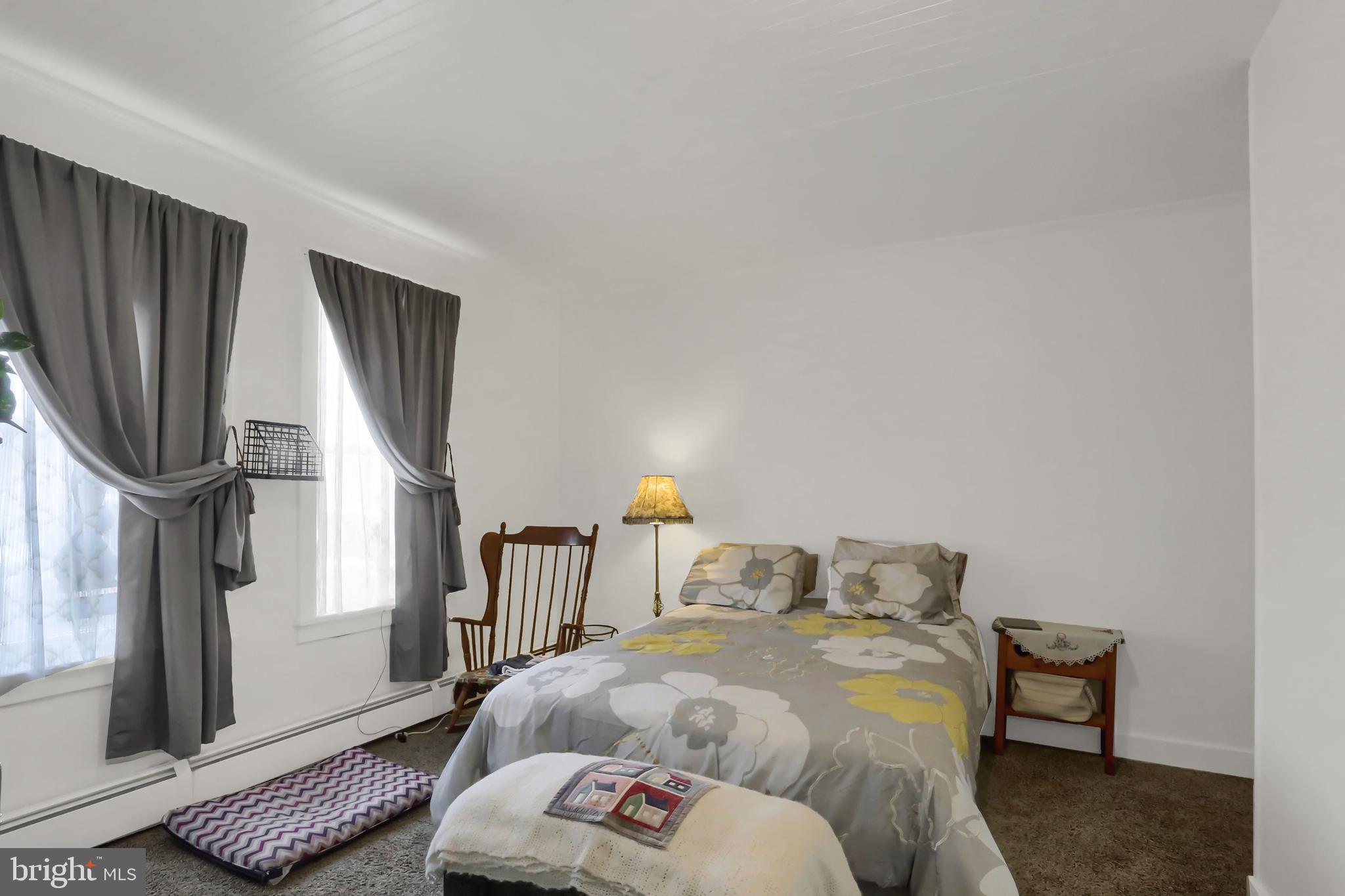 135 East Market Street Berrysburg, PA 17023 - Photo 20 of 45 a living room with furniture and a window