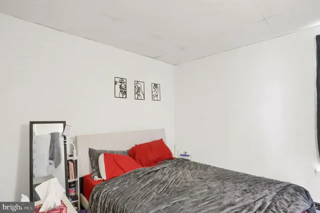 a bathroom with a sink mirror and window