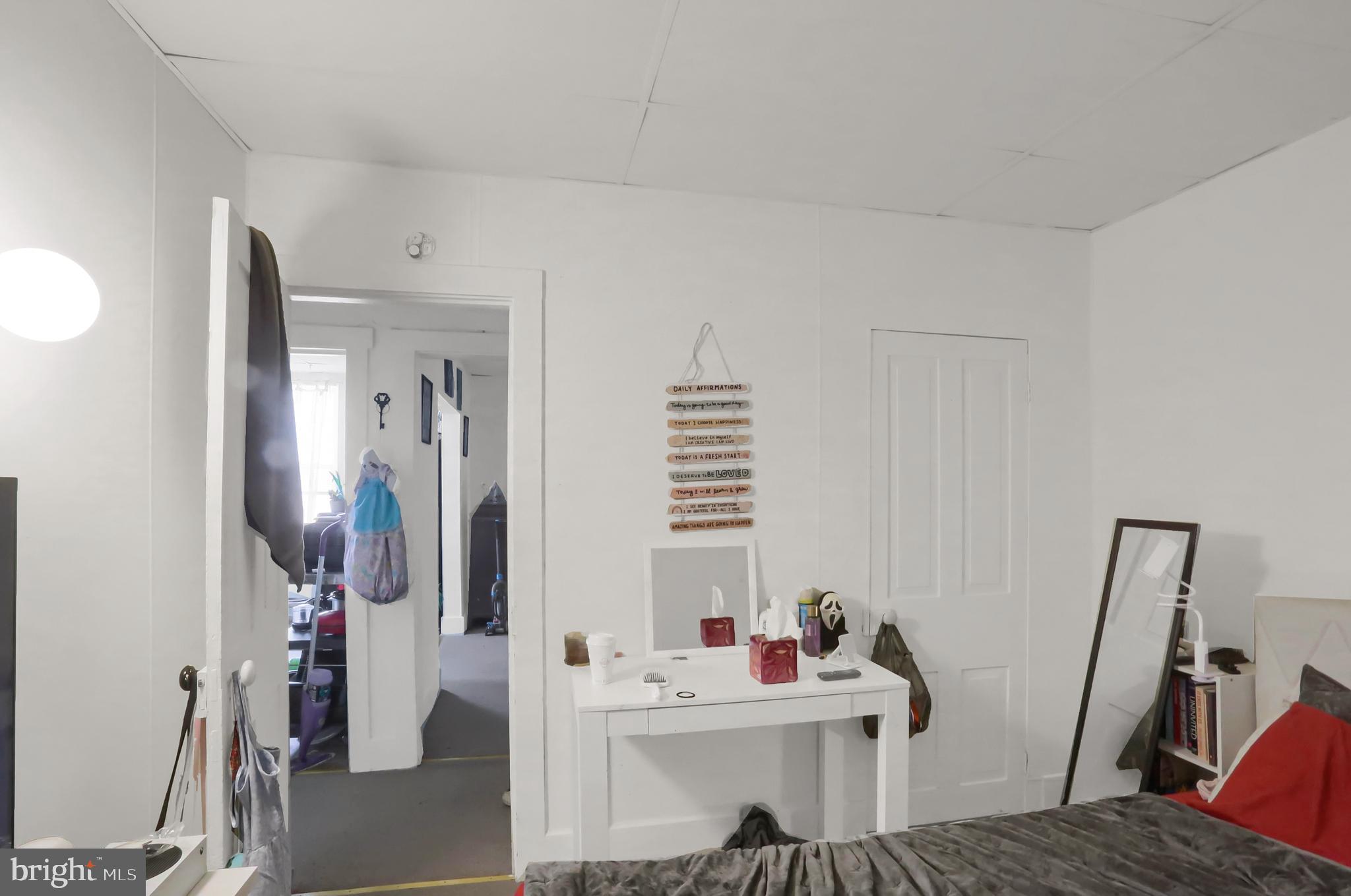 135 East Market Street Berrysburg, PA 17023 - Photo 23 of 45 a bathroom with a sink mirror and window