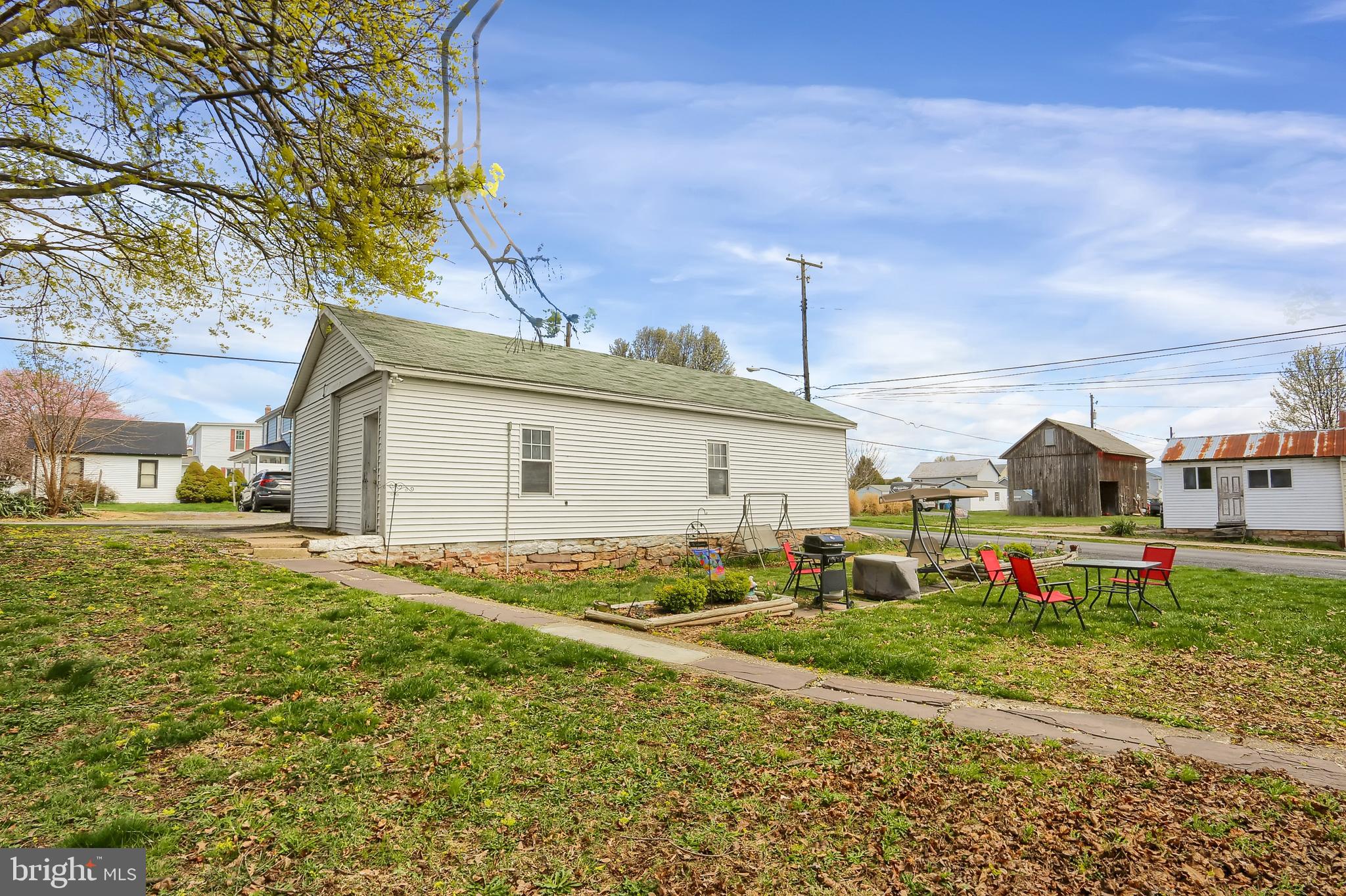 135 East Market Street Berrysburg, PA 17023 - Photo 6 of 45 a view of house with outdoor space and sitting area