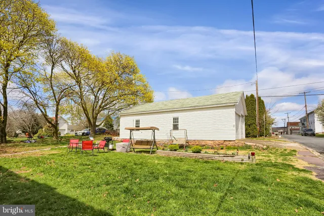 a childrens park with lots of swings and slides