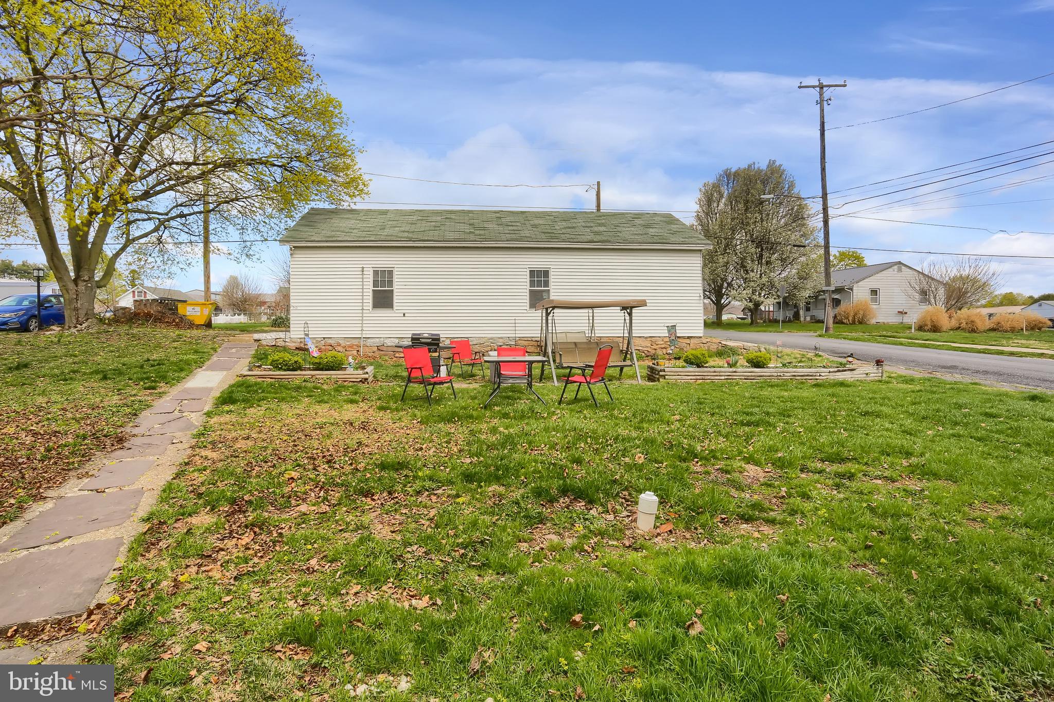 135 East Market Street Berrysburg, PA 17023 - Photo 10 of 45 a front view of a house with garden