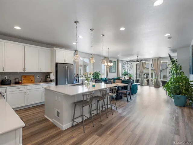 a kitchen with counter space cabinets and appliances