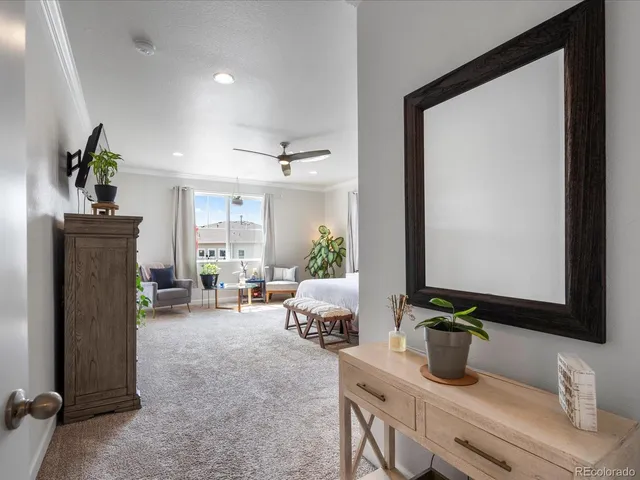 a living room with furniture and flat screen tv