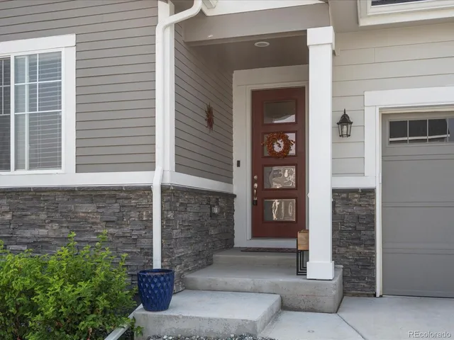 a view of a house with a windows and a pathway