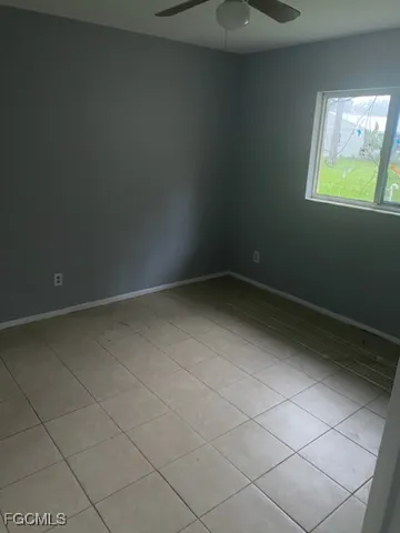 en empty room with windows