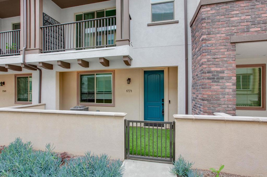 1771 Laurelwood Way Oceanside, CA 92056 - Photo 2 of 46 front view of a house with a large window