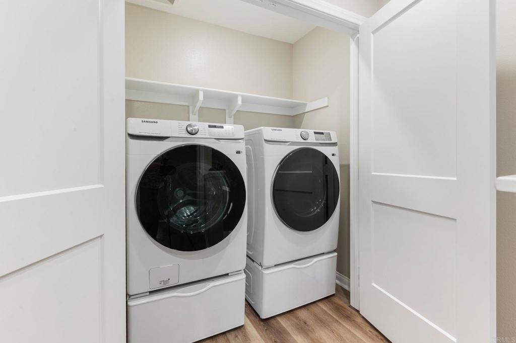 1771 Laurelwood Way Oceanside, CA 92056 - Photo 23 of 46 a utility room with dryer and washer