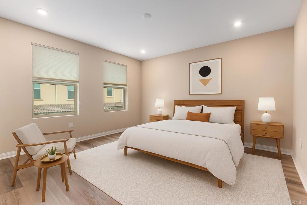 1771 Laurelwood Way Oceanside, CA 92056 - Photo 24 of 46 a bedroom with a bed and a chair