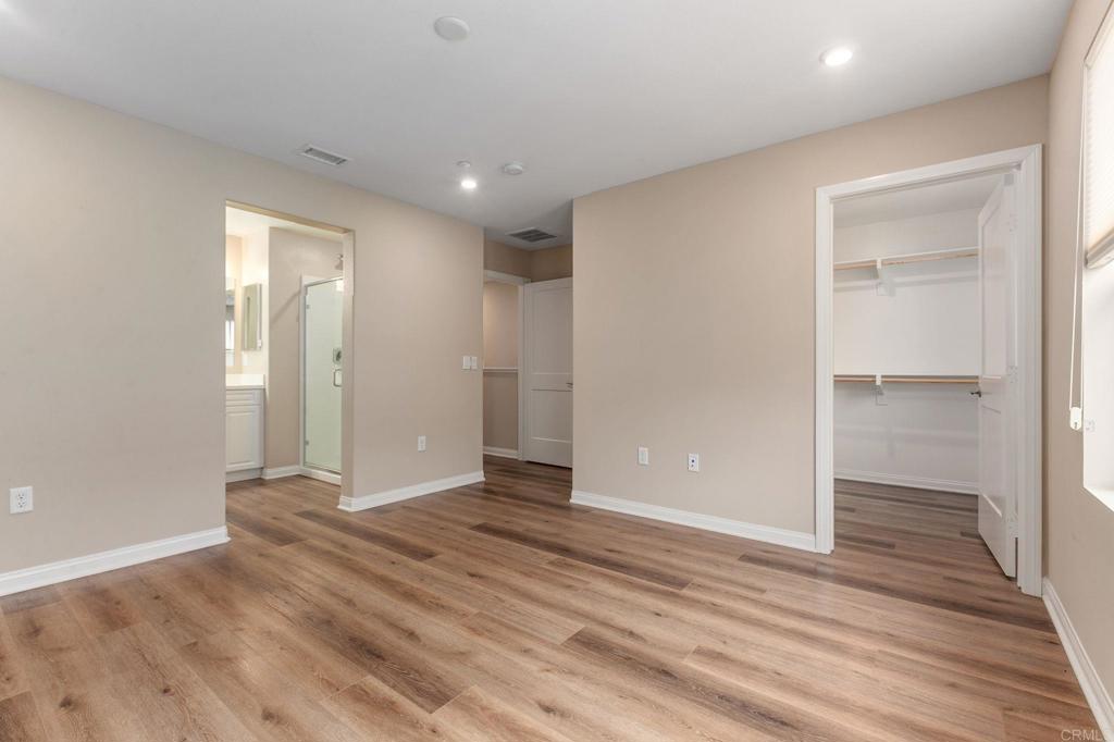 1771 Laurelwood Way Oceanside, CA 92056 - Photo 26 of 46 wooden floor in an empty room with wooden floor
