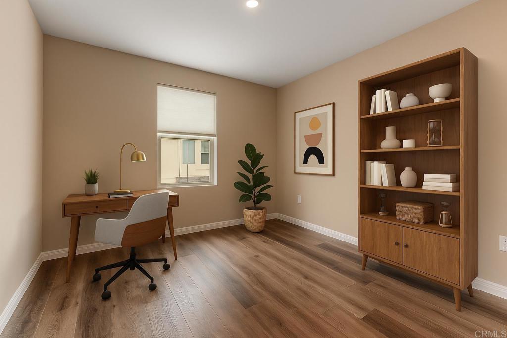 1771 Laurelwood Way Oceanside, CA 92056 - Photo 32 of 46 a view of a workspace with furniture and wooden floor