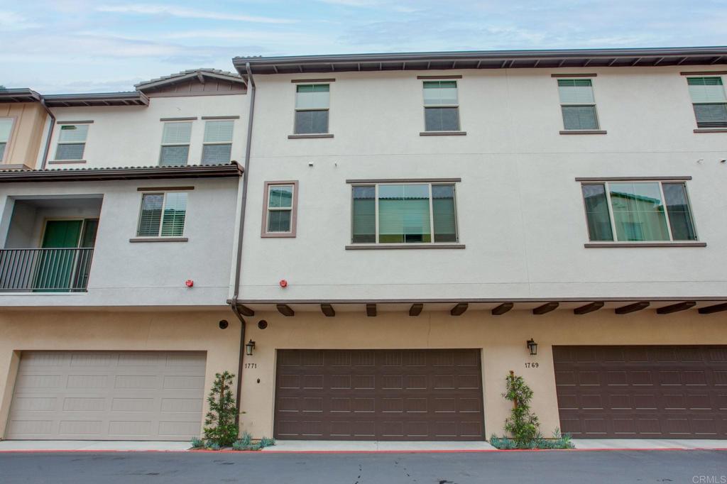 1771 Laurelwood Way Oceanside, CA 92056 - Photo 35 of 46 a front view of a house with garage