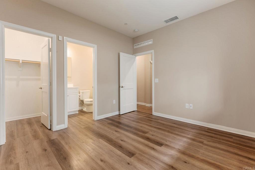 1771 Laurelwood Way Oceanside, CA 92056 - Photo 9 of 46 wooden floor in an empty room