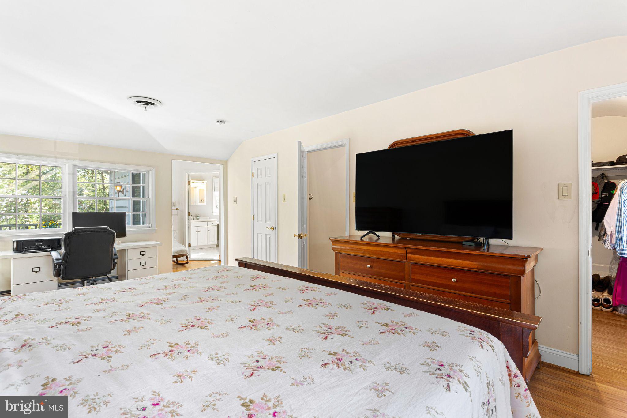 1 Birchall Drive Haddonfield, NJ 08033 - Photo 17 of 45 a bedroom with a bed and a flat screen tv