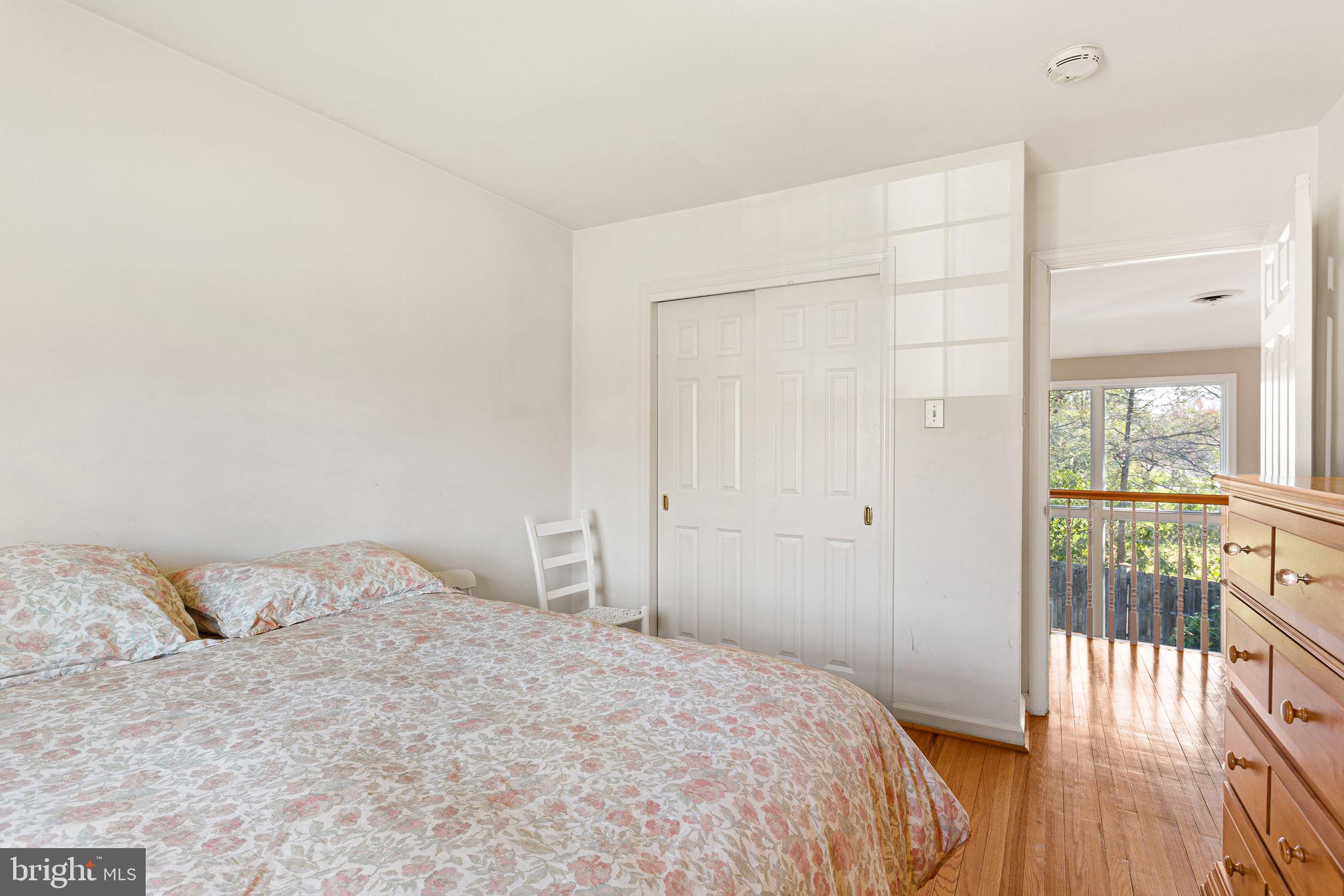 1 Birchall Drive Haddonfield, NJ 08033 - Photo 31 of 45 a bedroom with a bed and wooden floor