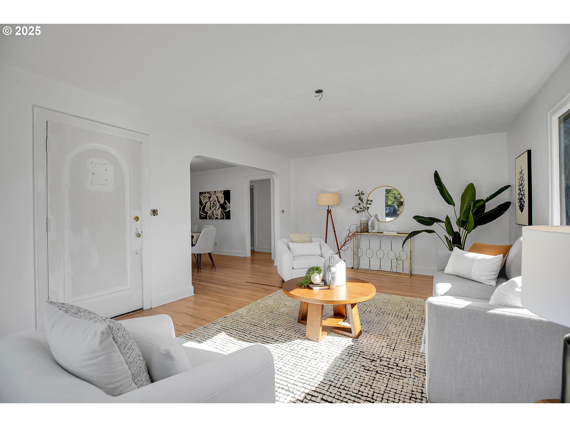 574 South Ivy Street Canby, OR 97013 - Photo 19 of 41 a living room with furniture and wooden floor
