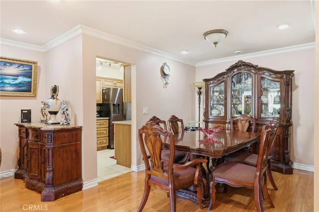 a view of a dining room with furniture and window