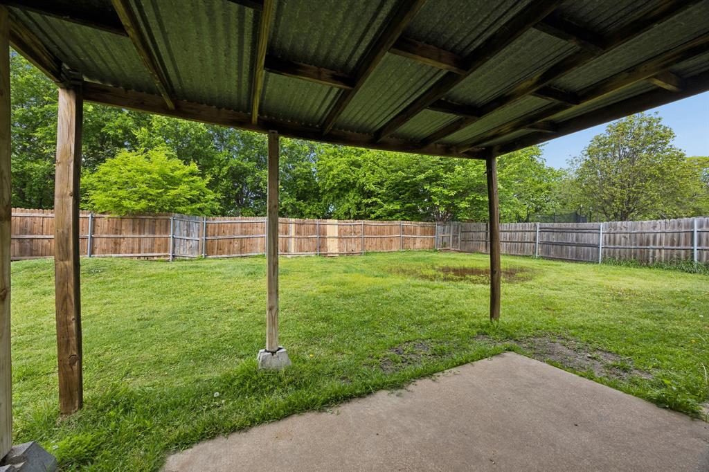 303 Vista Ridge Drive Venus, TX 76084 - Photo 23 of 25 a view of a house with backyard